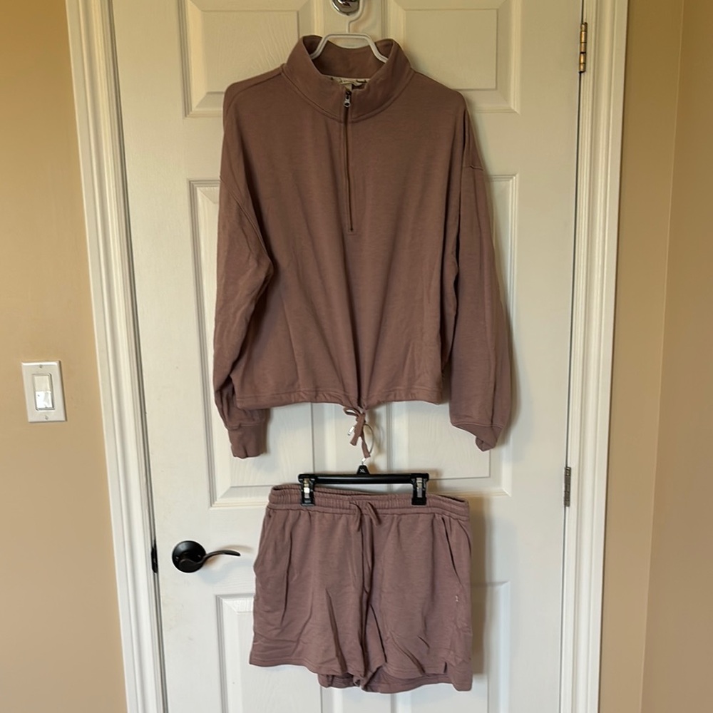 Women's Ripzone Mauve 1/4 zip sweater and matching shorts set.